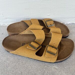 Tan and brown Birkenstock Arizona sandals